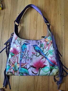 This vibrant, hand-painted leather bag is the Spring Passion Fringed Shoulder Ho